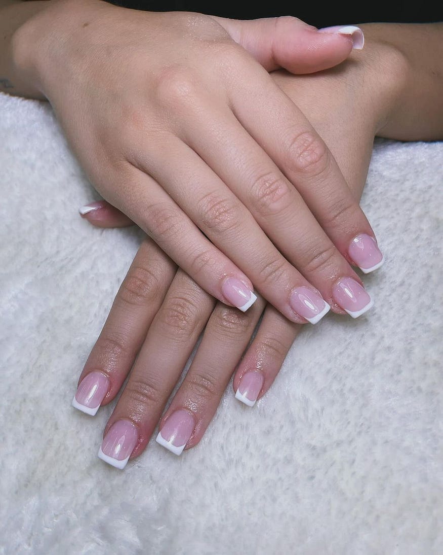 Gel Manicure: Nails with a glossy finish after a gel manicure at Athira Spa Altrincham.