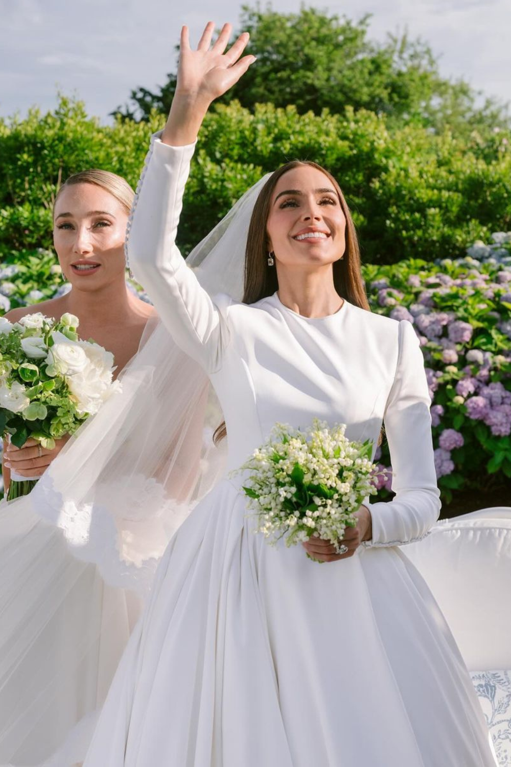Olivia Culpo, wedding dress, modest gown, bridal fashion, Dolce & Gabbana, Miss Universe, controversy, debate, social media, fashion critics, modesty, marriage, beauty standards, individuality, bridal trends, long-sleeved, high-neck.