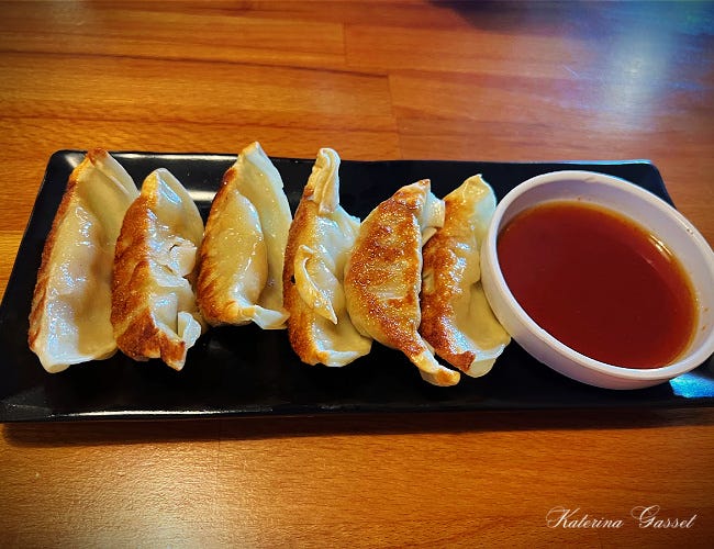 This is a photo of gyoza, one of the appetizers served at Asa Ramen located near Provo Utah. Photo by Katerina Gasset of the Gasset Group Mother-and-Son Real Estate Team in Utah brokered by eXp Realty…
