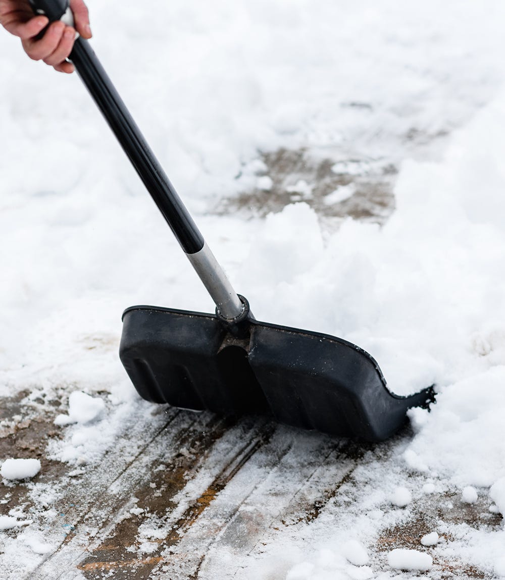 Shovelling snow.