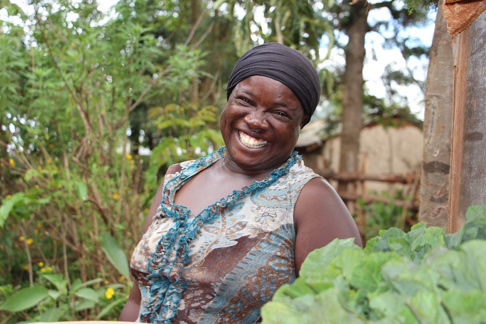 Village Enterprise business owner Betty Amase smiling