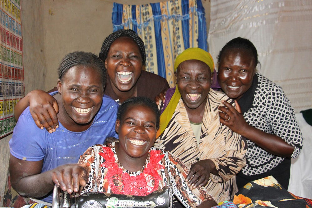 Village Enterprise female business owners grinning
