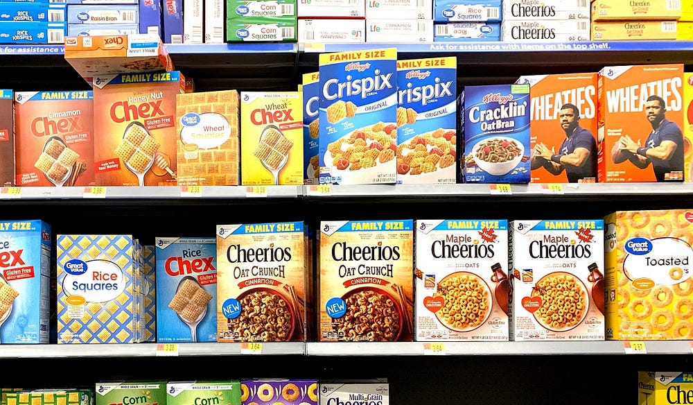 Choice overload on the supermarket shelf with so many cereal product options.