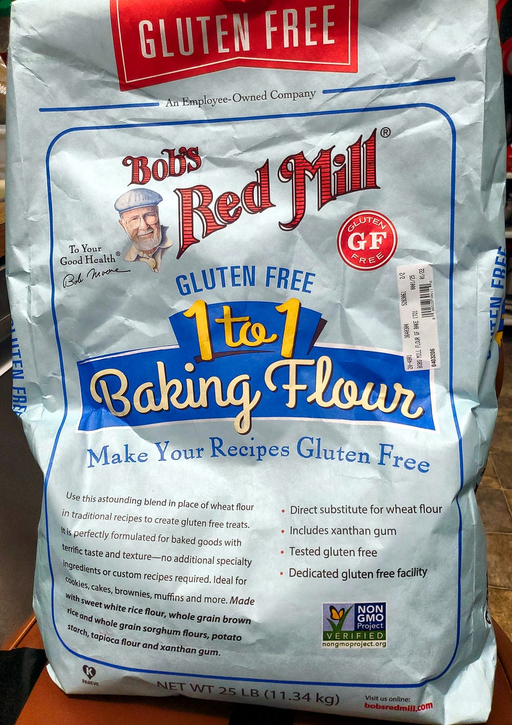 Twenty five pound bag of Bob’s Red Mill gluten-free one to one baking flour in a light blue bag.