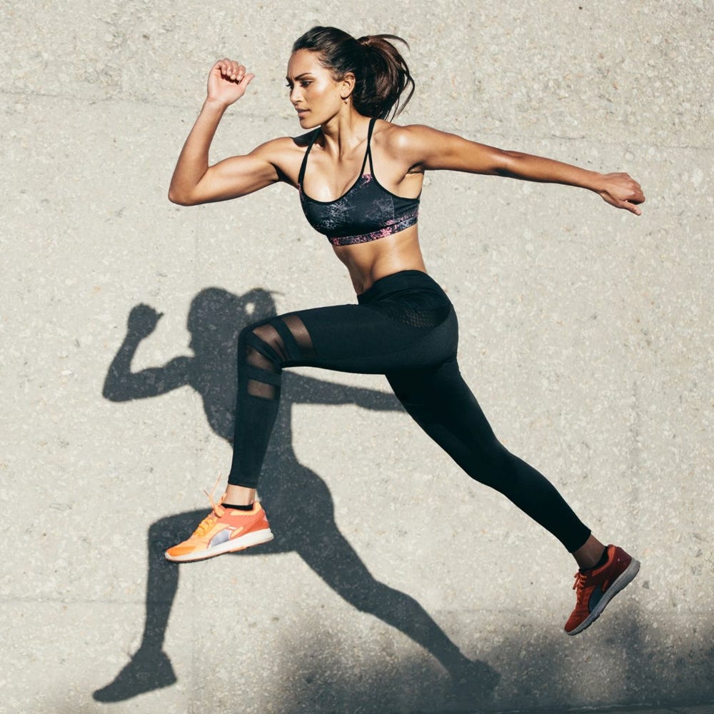 a girl running and jumping.