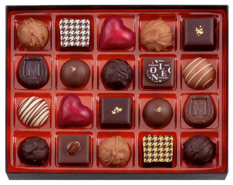 Box of impeccably made, high quality Valentine's Day chocolates.