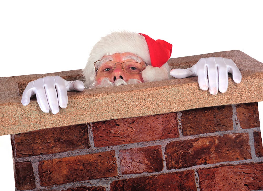 Santa in chimney.