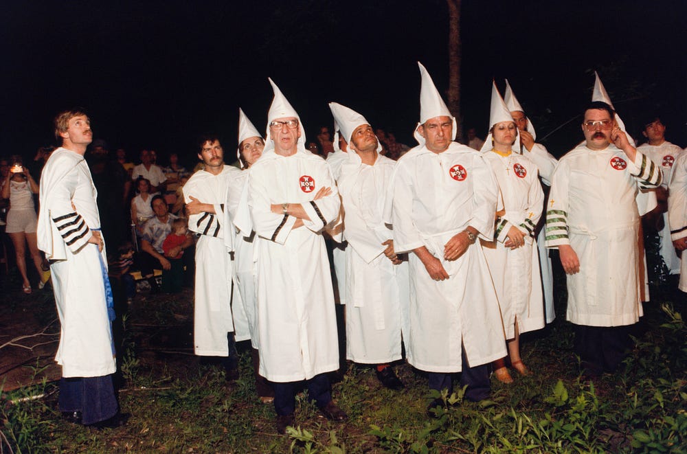 Why does the Ku Klux Klan burn crosses? They got the idea from a movie.