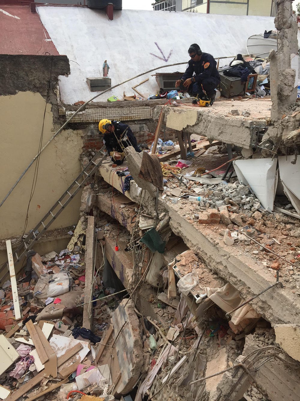 This highly trained crew used rescue dogs, listening devices and search cameras to search through the rubble.