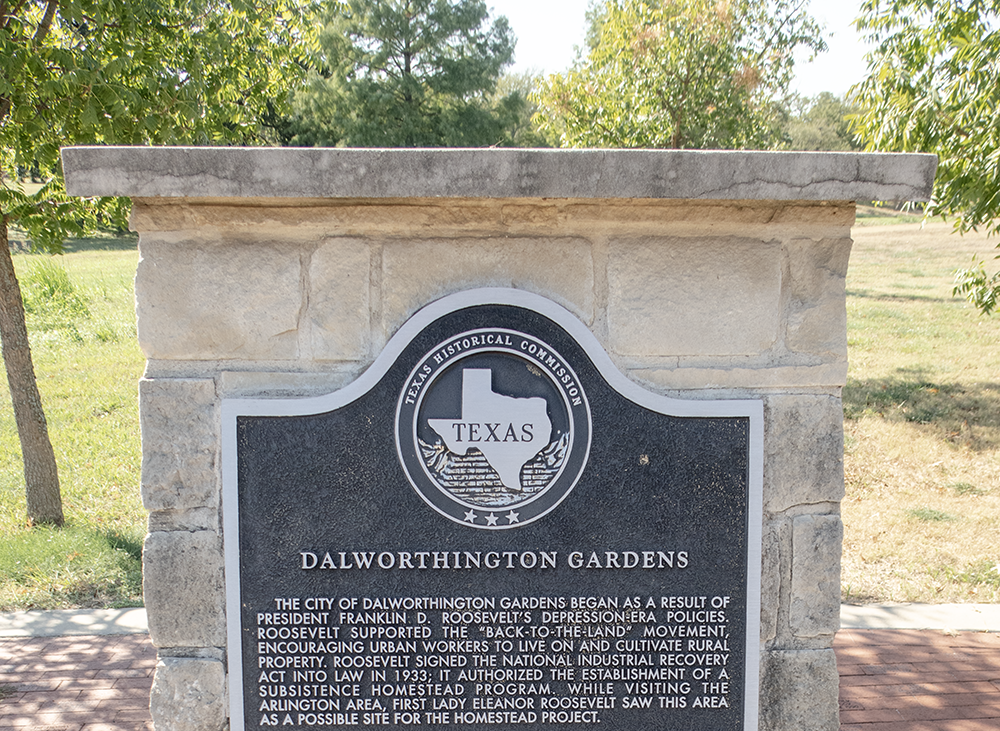 Top portion of Texas Historical Commission Marker in Gardens Park, Dalworthington Gardens, Texas. Photo taken and edited by author.