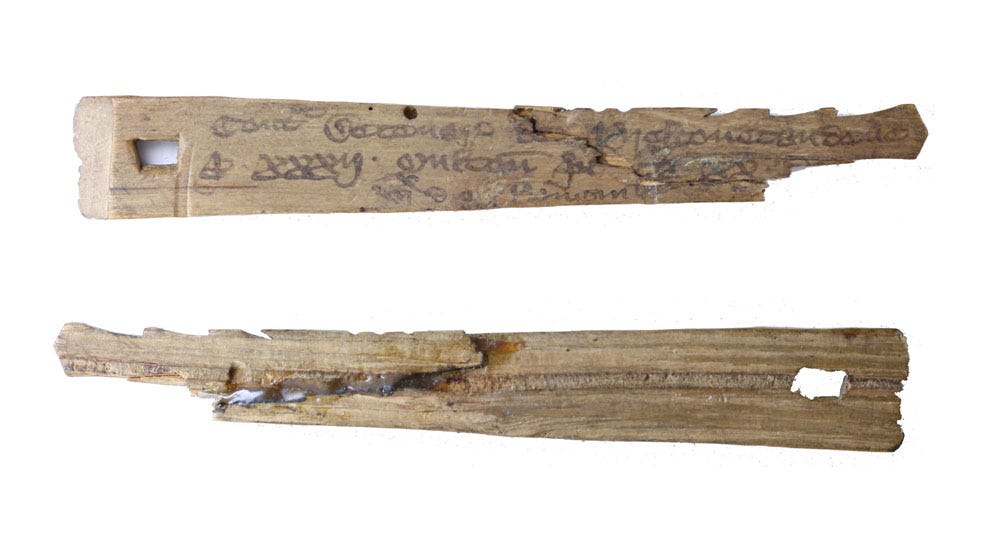 Medieval English split tally stick (front and reverse view). The stick is notched and inscribed to record a debt owed to the rural dean of Preston Candover, Hampshire, of a tithe of 20d each on 32 sheep, amounting to a total sum of £2 13s. 4d. — Source Wikipedia