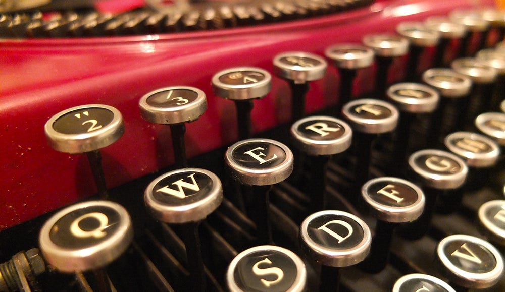 Close up of keys on an antique typewriter.