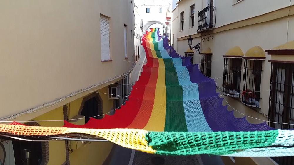 A 50m rainbow flag for pride month, crocheted in lockdown in southern Spain’s province of Cordoba
