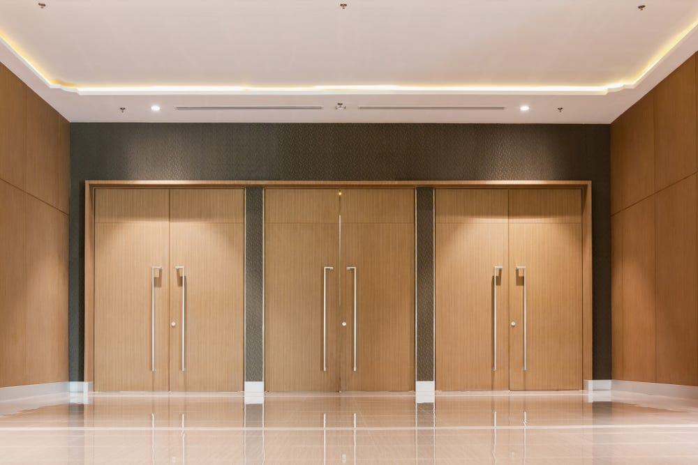 Three cloased conference room doors