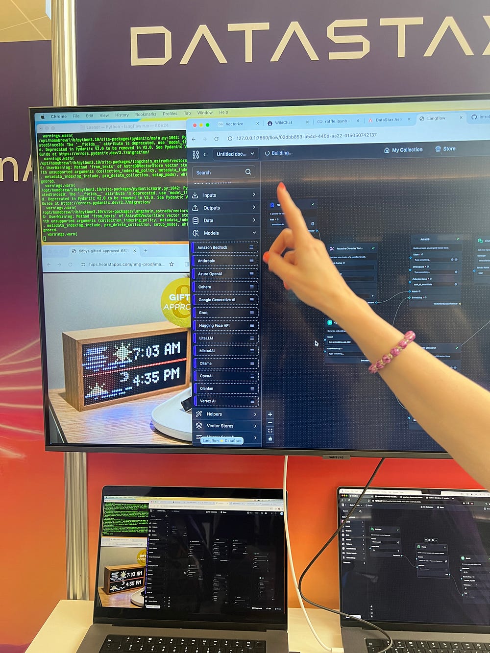 Picture of me with an Ansys prize(KeyChron V6) and a demo at DataStax 