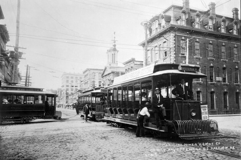 Streetcars in Raleigh, NC, circa 1910 with attendants.