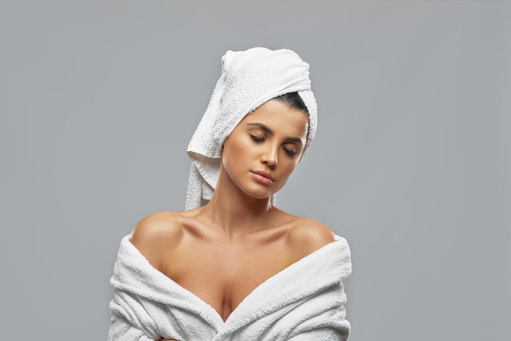 a girl wrapped in a Maxoshine microfiber bath towel