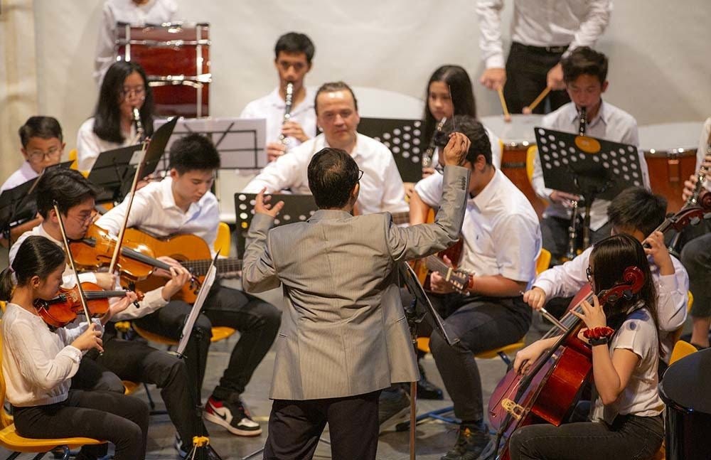 Students and teachers during orchestra rehearsals at the German School Jakarta