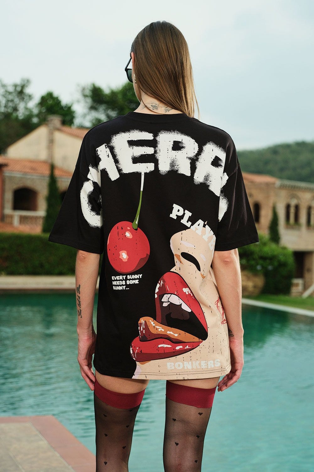 Trendy Cherry Playboy Oversized T-shirt by a brand called bonkers Corner featuring bold red hues and eye-catching details.