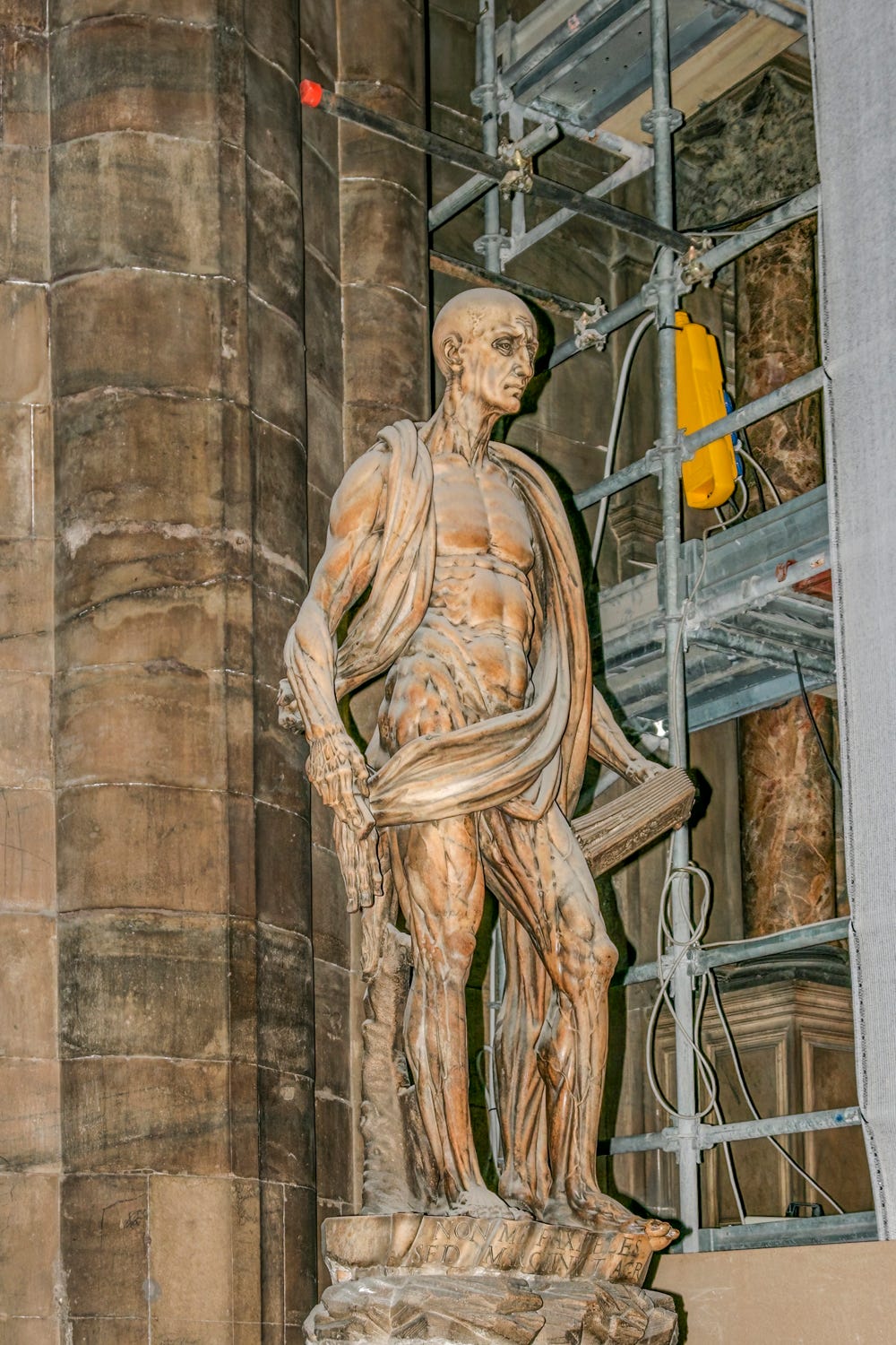 Statue in the Milan Cathedral of a flayed St Bartholomew wearing his skin like a blanket.