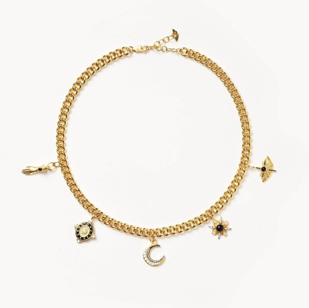 Gold Bracelet with Five Charms.