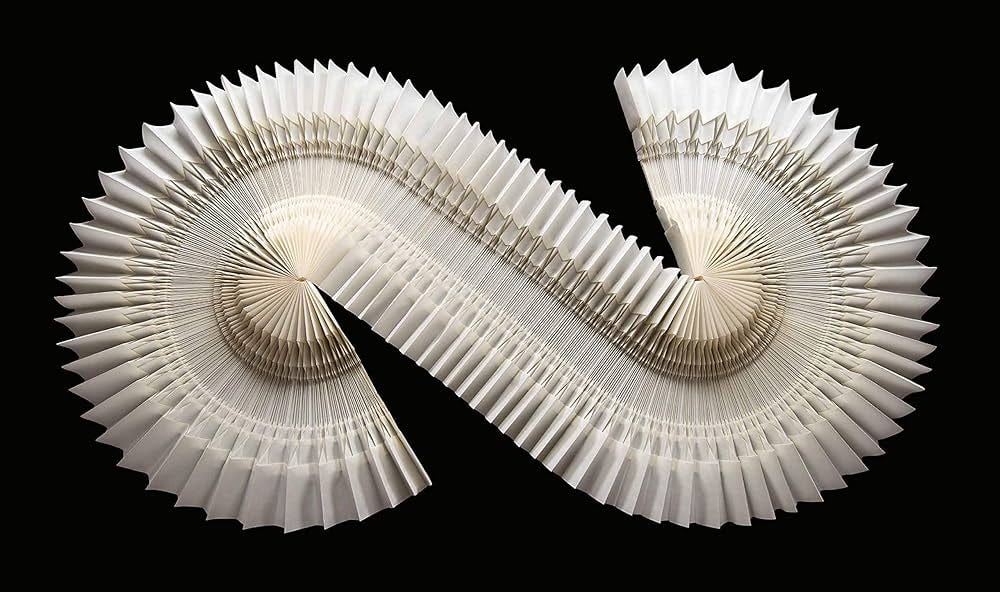 A photo of an accordion-like modular spiral origami design by Tomoko Fuse.