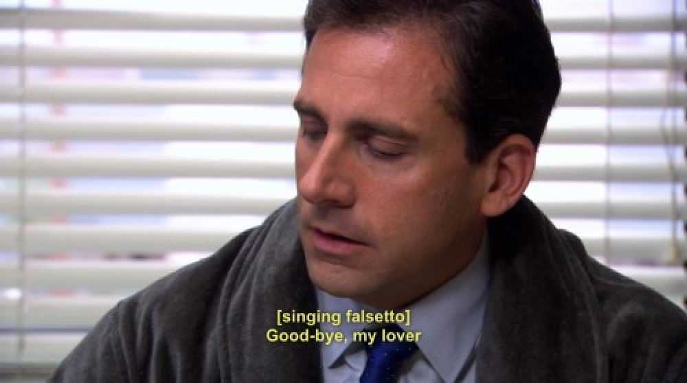 Michael Scott wearing a dressing gown and singing falsetto “Goodbye my lover”, whilst looking sad