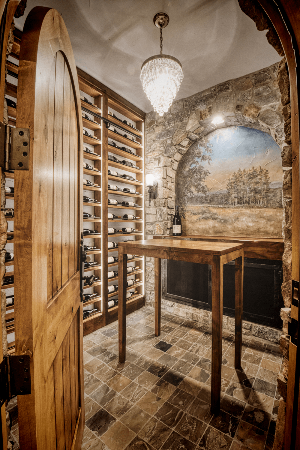 A custom Tuscan-style stone wine cellar.