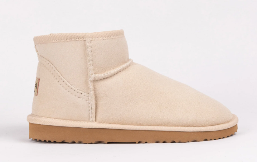 UGG SINCE 1974 MINI BOOTS