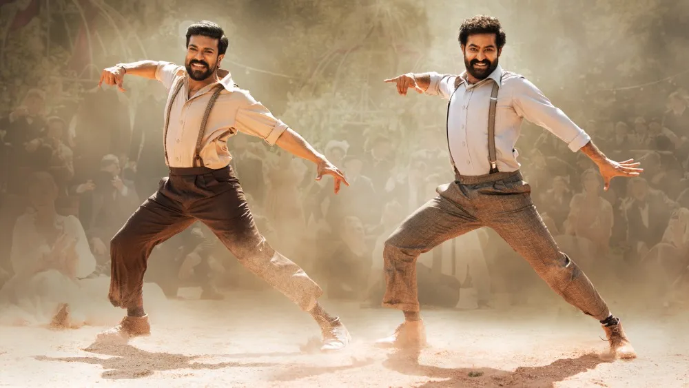 Bheem and Raju, the heroes of RRR, in the middle of their famous dance number.
