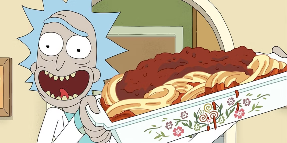 Screenshot from the show Rick and Morty showing rick holding a tray of delicious spaghetti