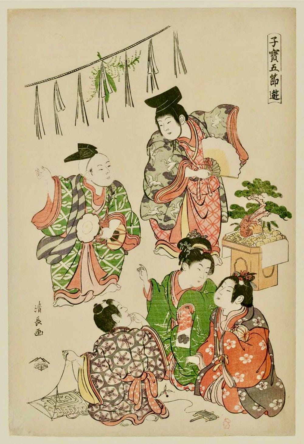 New Year's woodblock print of children dressed in elaborate kimonos beneath a shimenawa rope hung with tassels. Two boys are dancing, one boy is sitting on the ground with his kite, and two girls are sitting and chatting near a bonsai plant on a low table.