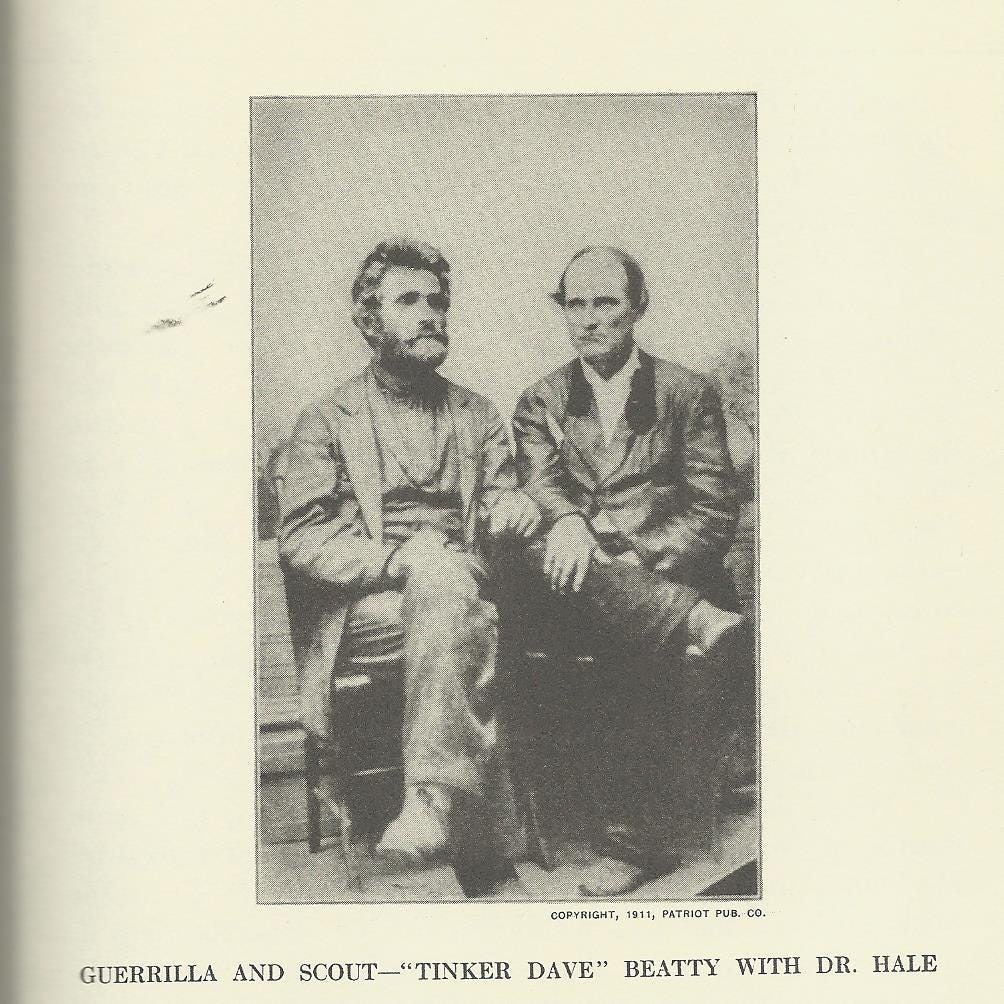 A picture of Dr. Hale (left) and Tinker Dave Beatty (right). Both are seated.