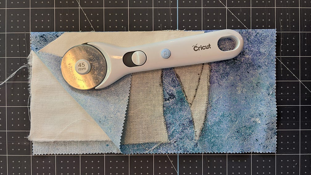 pattern and fabric lined up and ready to cut