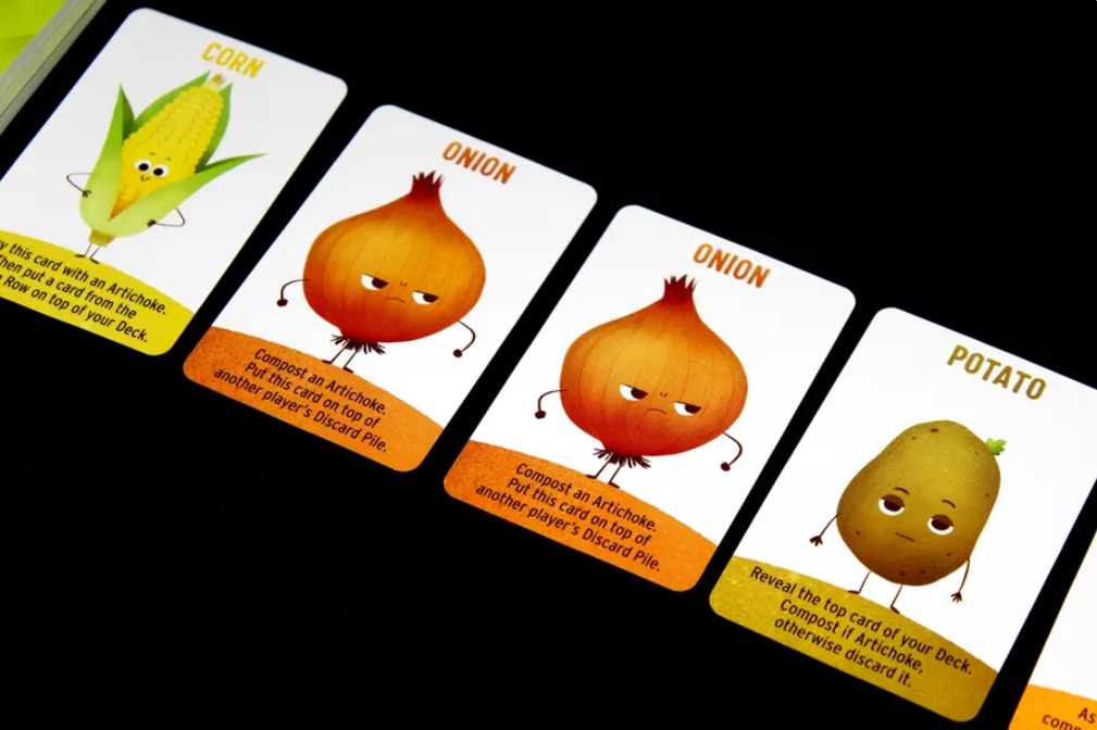 Several cards from the game Abandon All Artichokes. From left to right, there is corn, onion, onion, and potato. The text regarding onion is referenced and basically cited in the main body.
