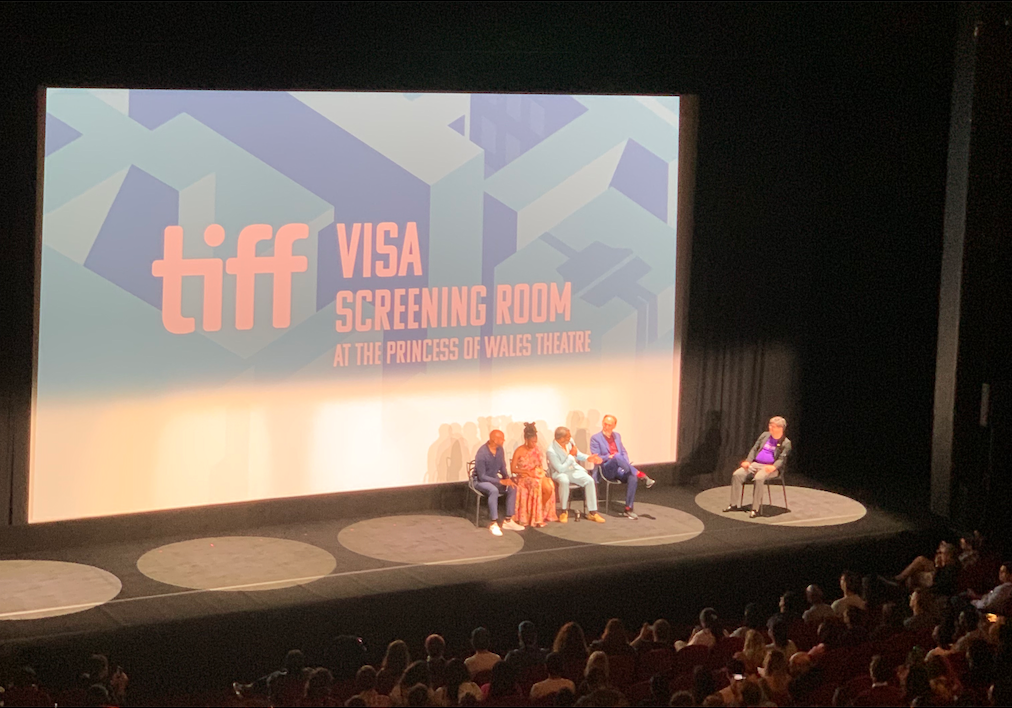 Keegan Michael Key, Lyric Ross, Jordan Peele, and Henry Selick seated on a stage, facing a seated Peter Kuplowsky. The text on the screen behind them reads: TIFF Visa Screening Room at the Princess of Wales Theatre.