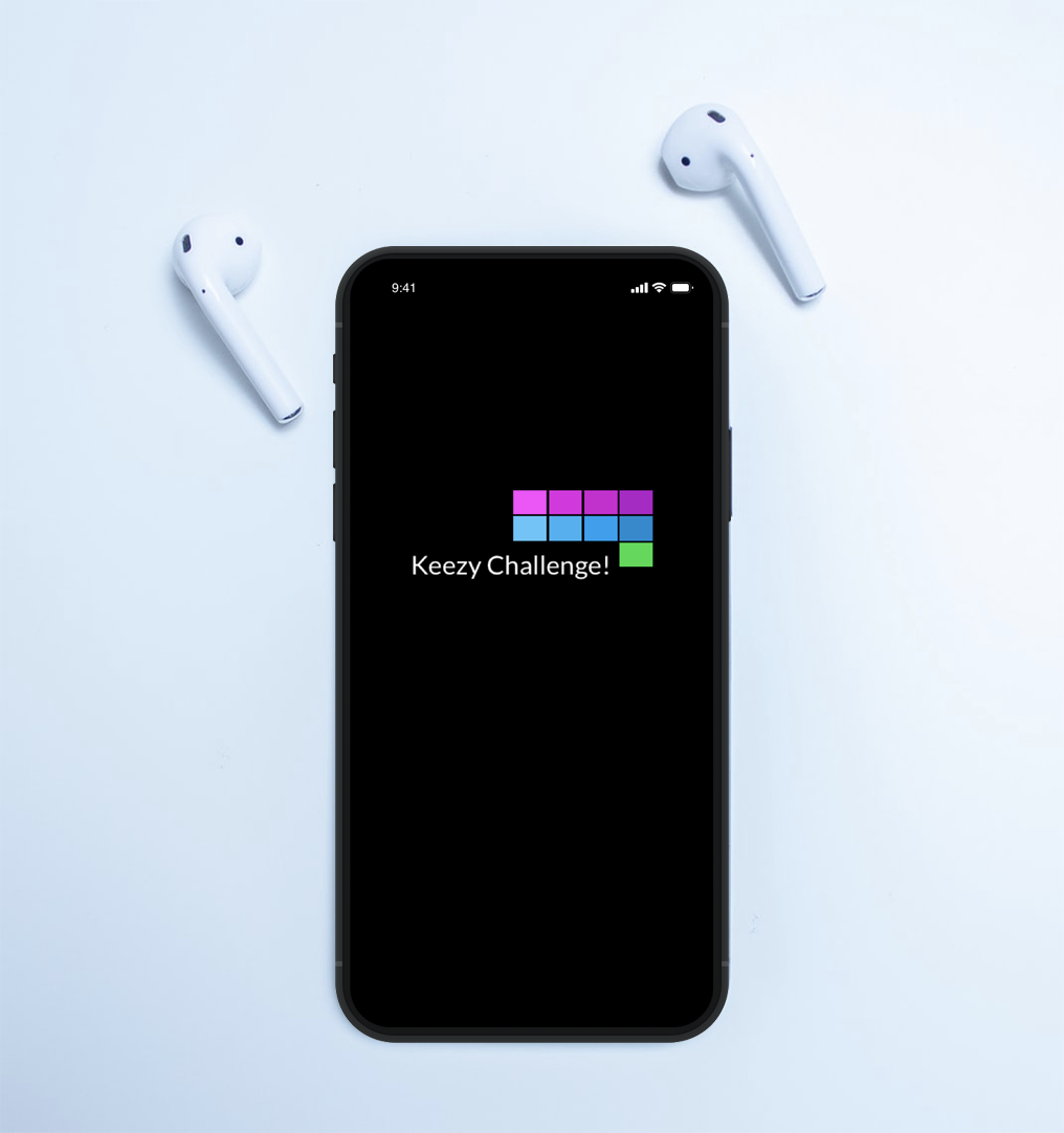 Image of headset and iphone loading the Keezy Challenge app