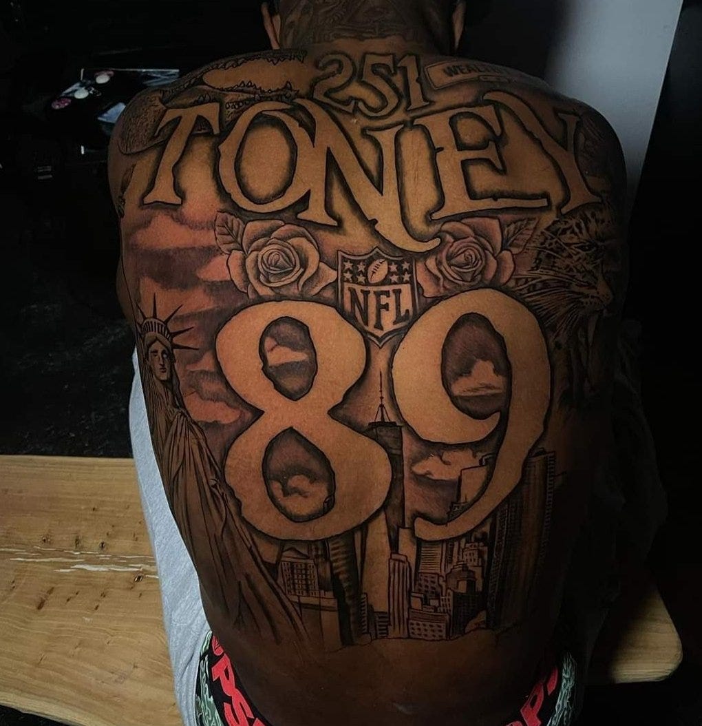Picture of Kadarius Toney’s back tattoo.