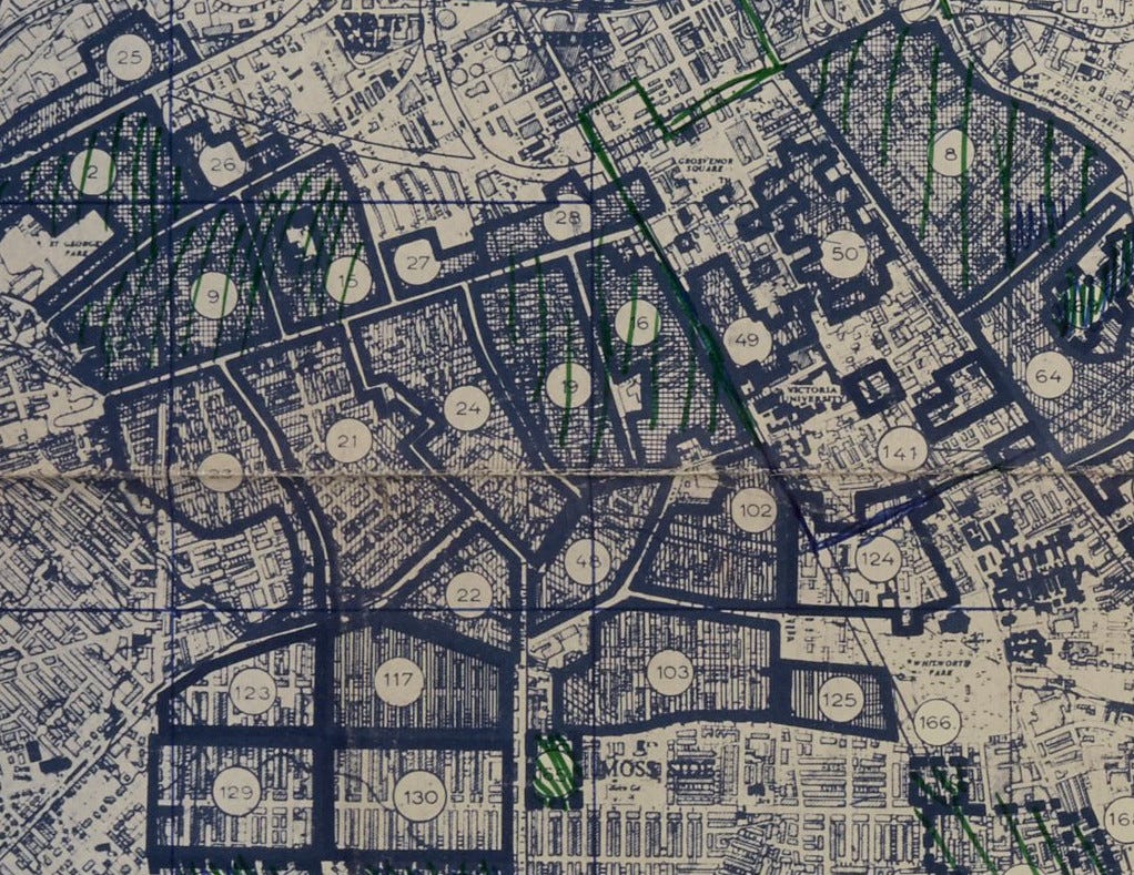Close up view of a map of Manchester showing Hulme, with areas to be demolished heavily outlined, shaded and numbered.