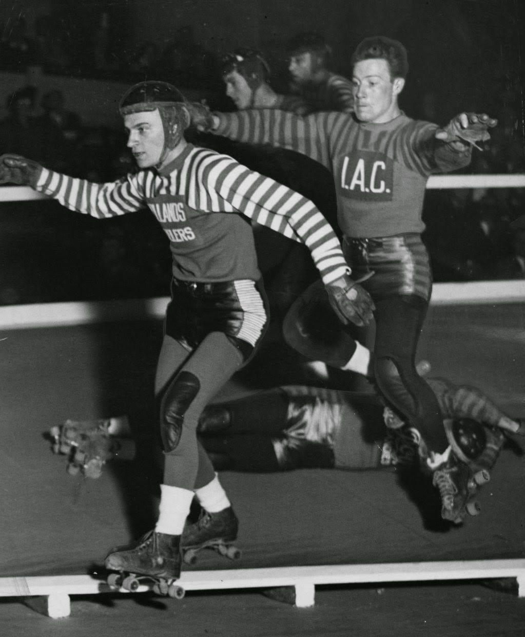 Two men roller derby skating. 1940.
