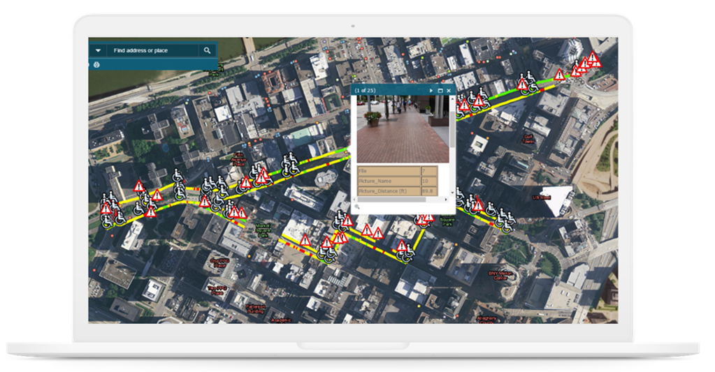 A map of downtown Pittsburgh showing sidewalk lines color-coded green, yellow, and red based on condition. A pop-up appears showing sidewalk data and an image of the sidewalk.