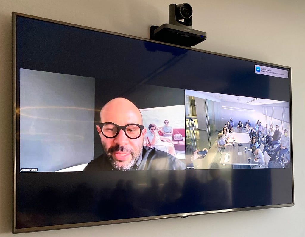 A photo of a monitor playing a Zoom meeting between Known partner Jacob Harris and students from USC Annenberg.