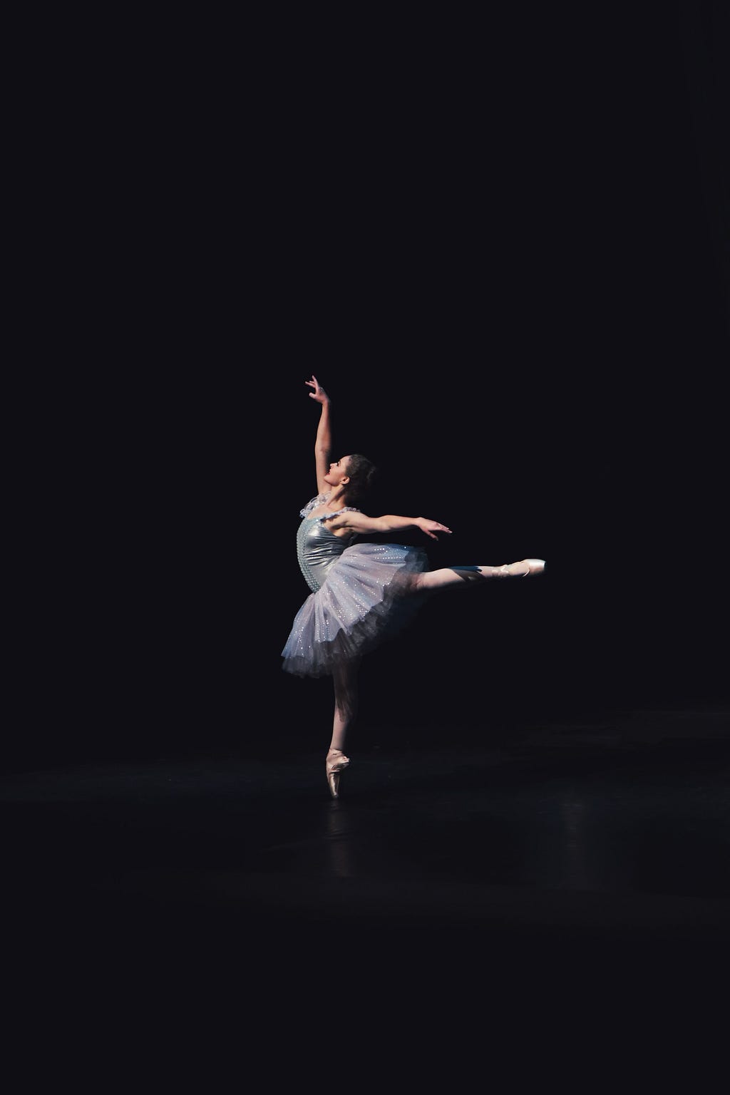 A ballet dancer in arabesque position.