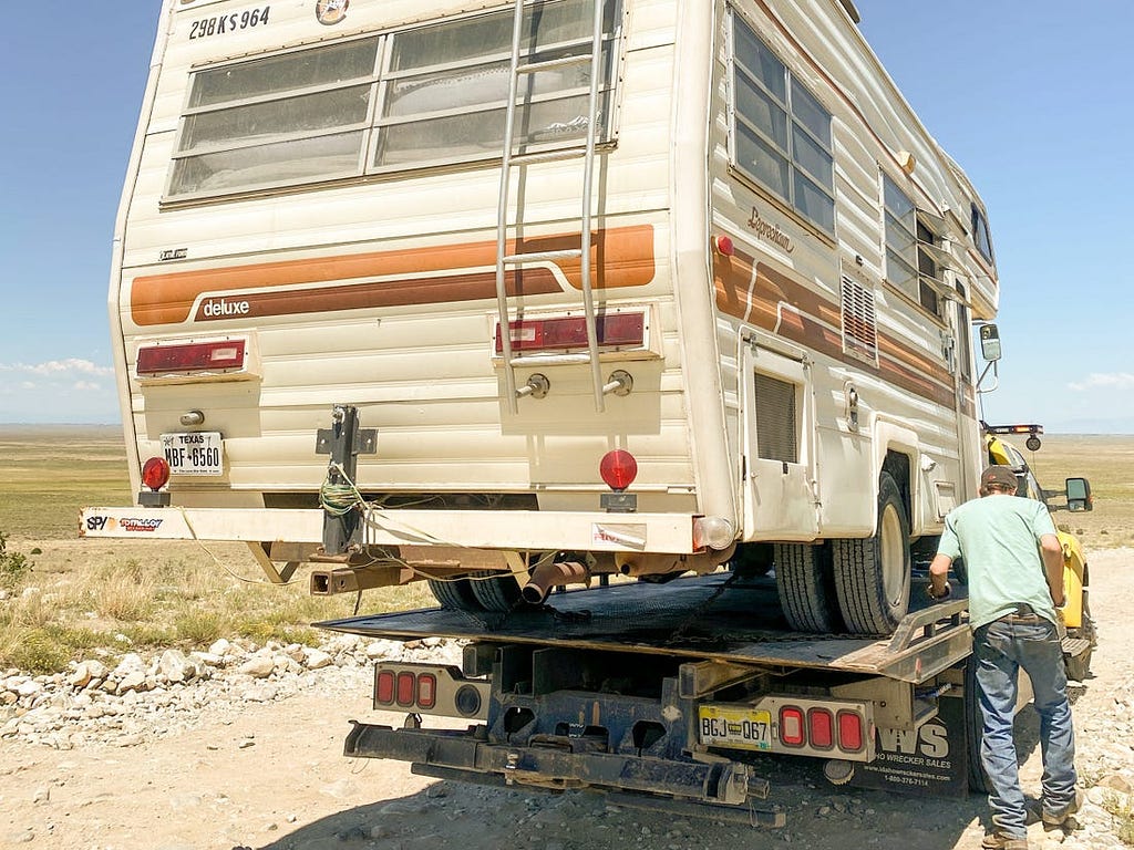 Contreras’ RV gets towed to be serviced.