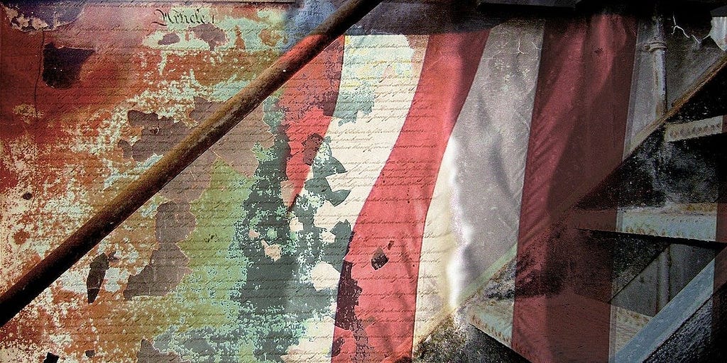 Tattered and faded American flag and Constitution — Image by cgrape from Pixabay