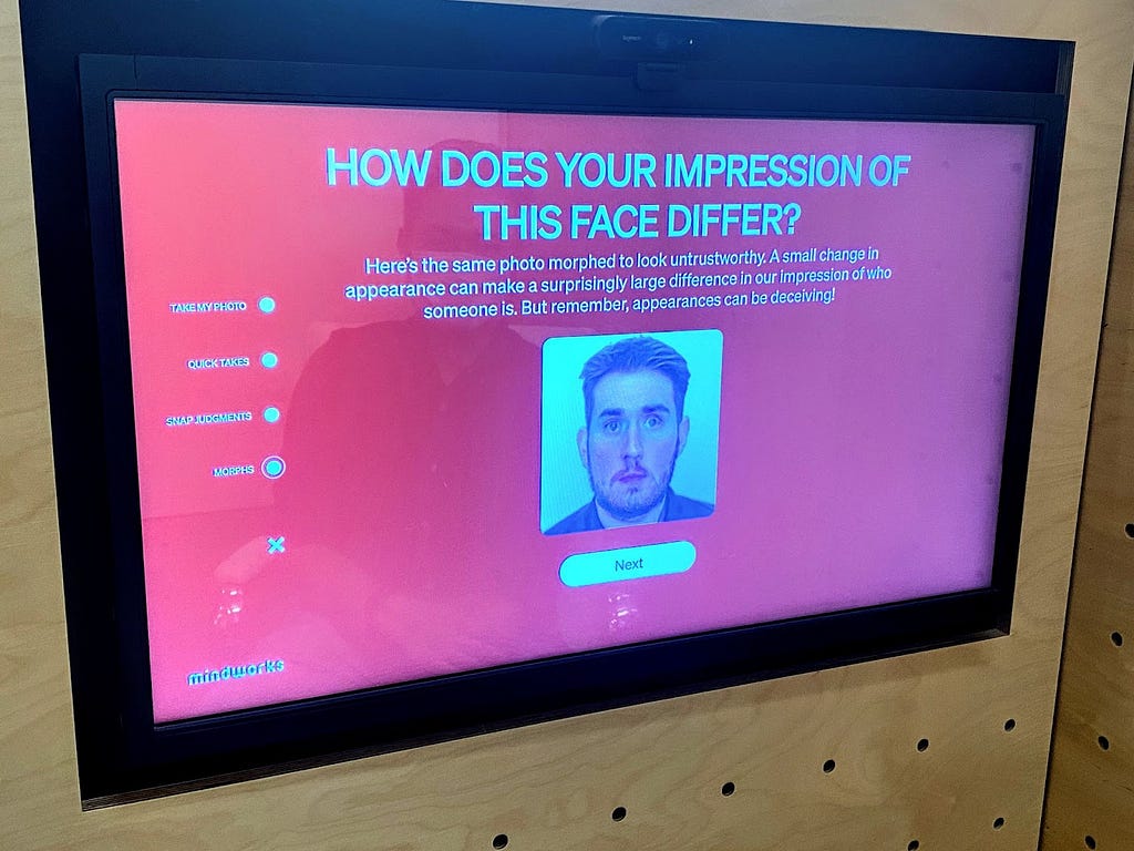 Image of “What’s in a face” exhibit with a composite image of Jorge