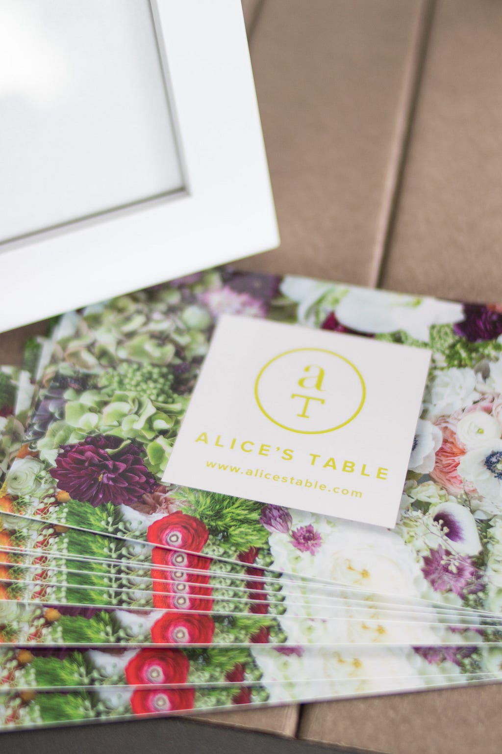 postcards with Alice's Table logo and website