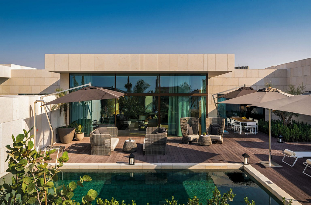 Outside deck and pool view of Bulgari Resort Dubai