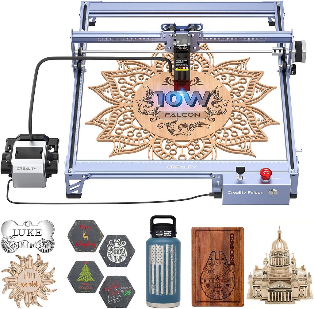 Image of an open frame laser cutter and engraver with a row of engraved products below it