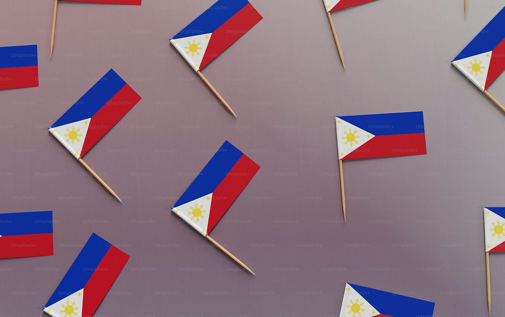 A group of Filipino flags on sticks